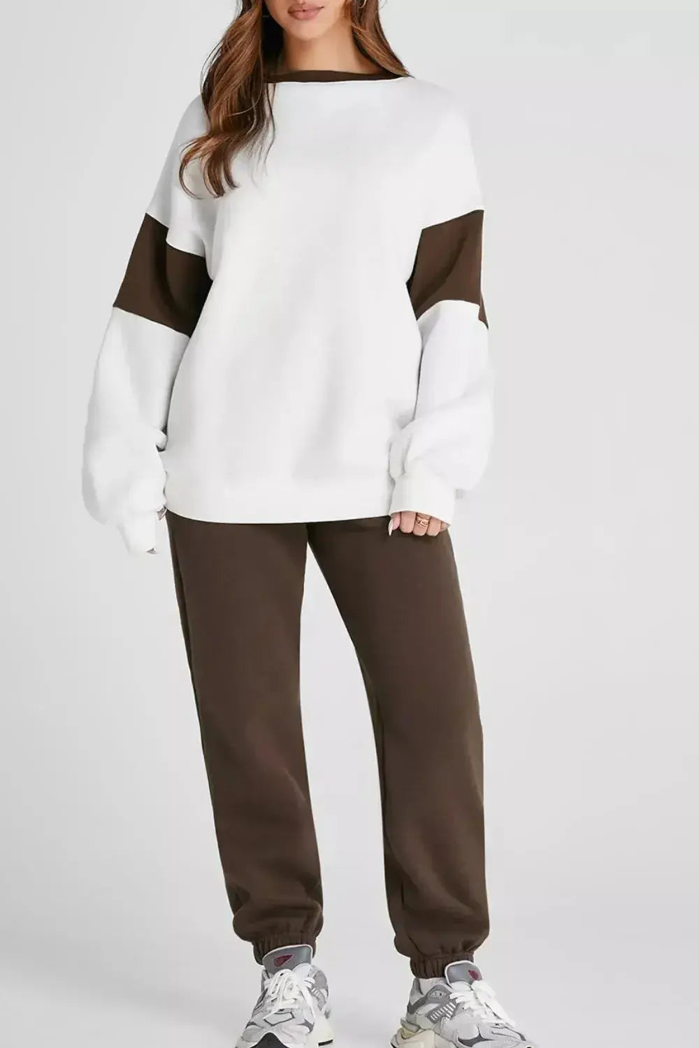 Women’s oversized drop shoulder sweatshirt and joggers loungewear set by Plush Fashion Hub, casual and comfortable jogging suit.