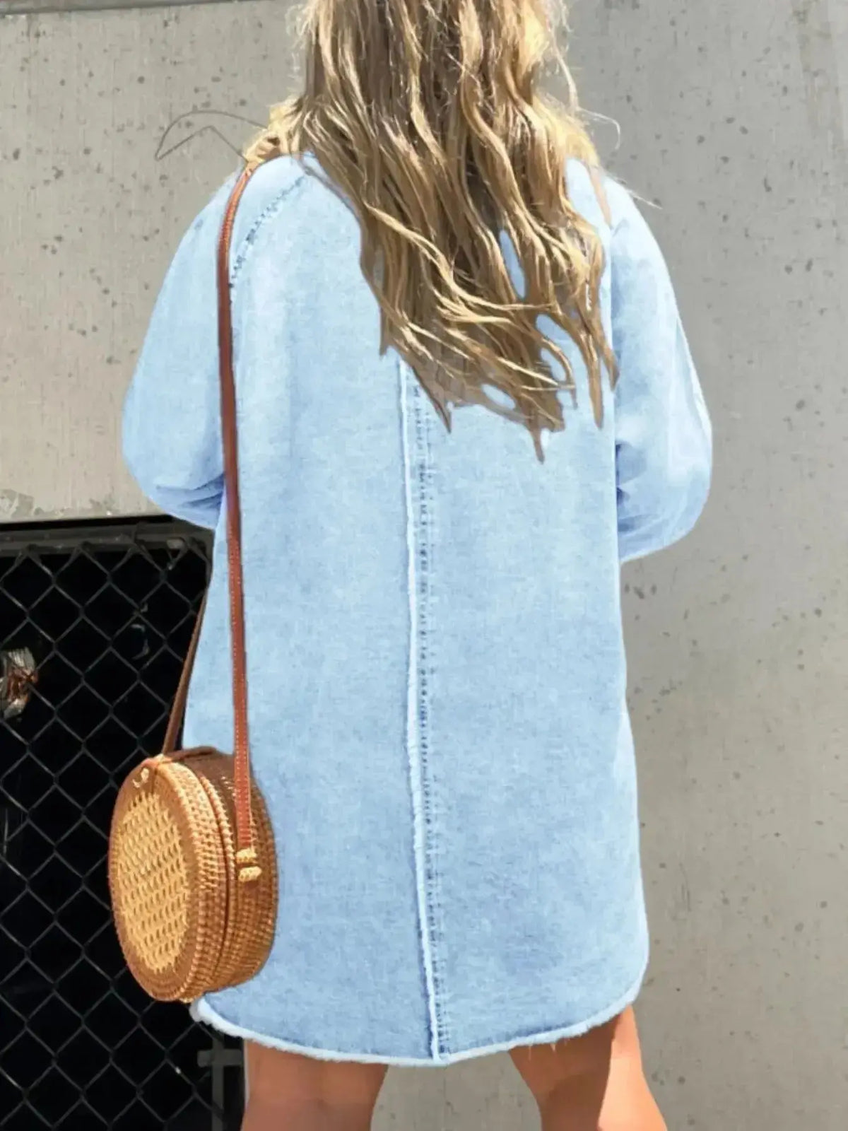 Women’s oversized long sleeve denim shirt dress with front pockets, from Plush Fashion Hub, casual and stylish for everyday wear.