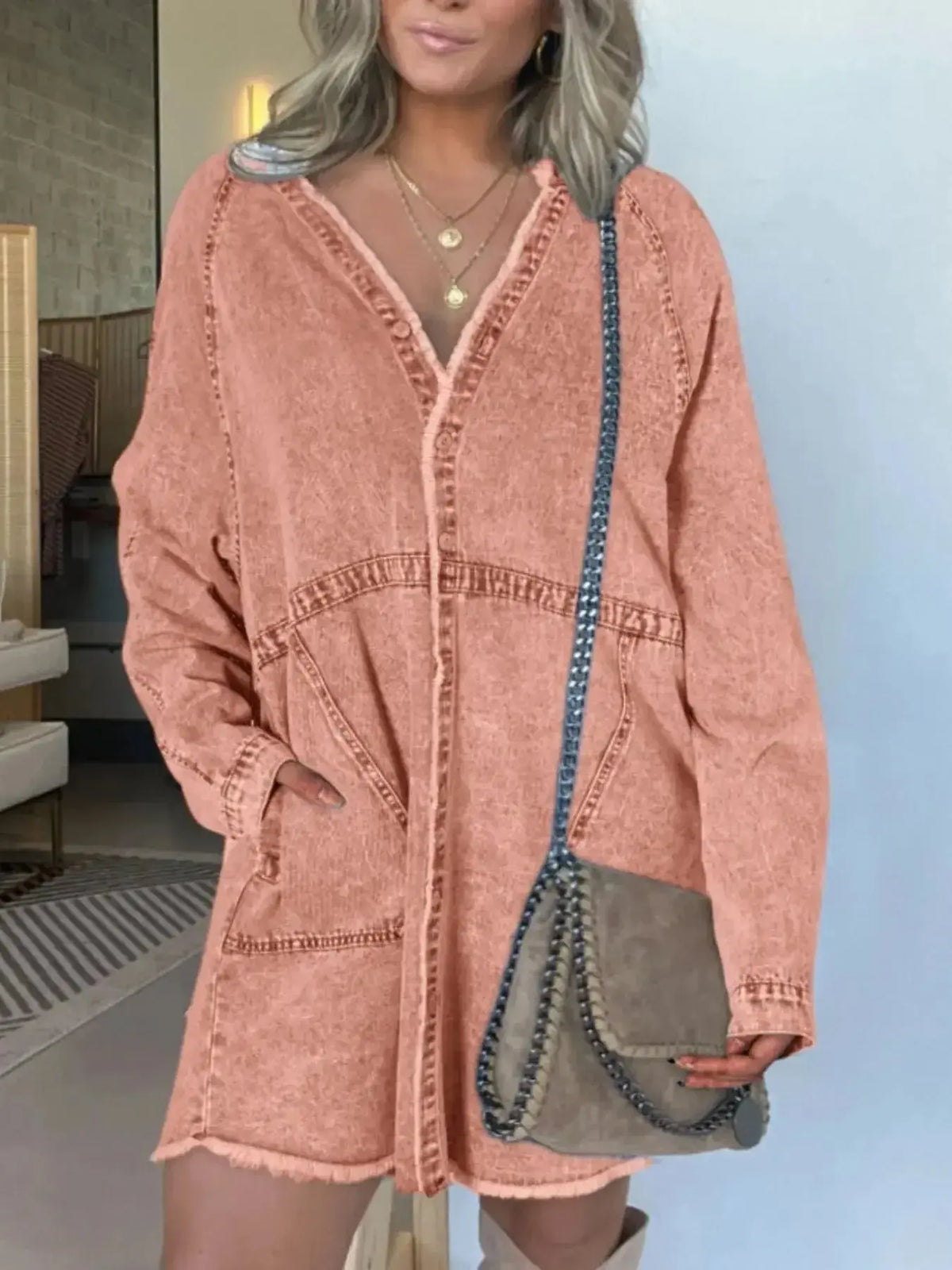 Women’s oversized denim shirt dress with long sleeves and front pockets, from Plush Fashion Hub, casual and stylish for everyday wear.