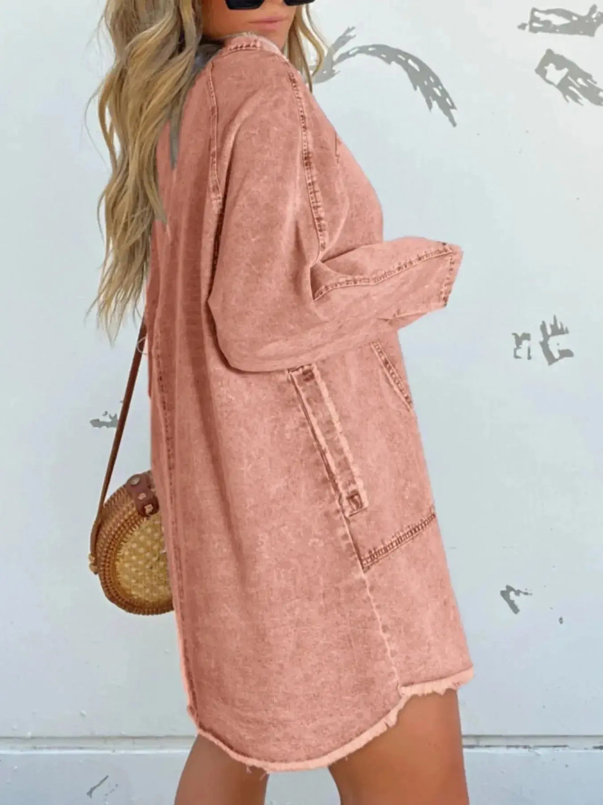 Women’s oversized long sleeve denim shirt dress with pockets, stylish casual dress by Plush Fashion Hub, shown on model.