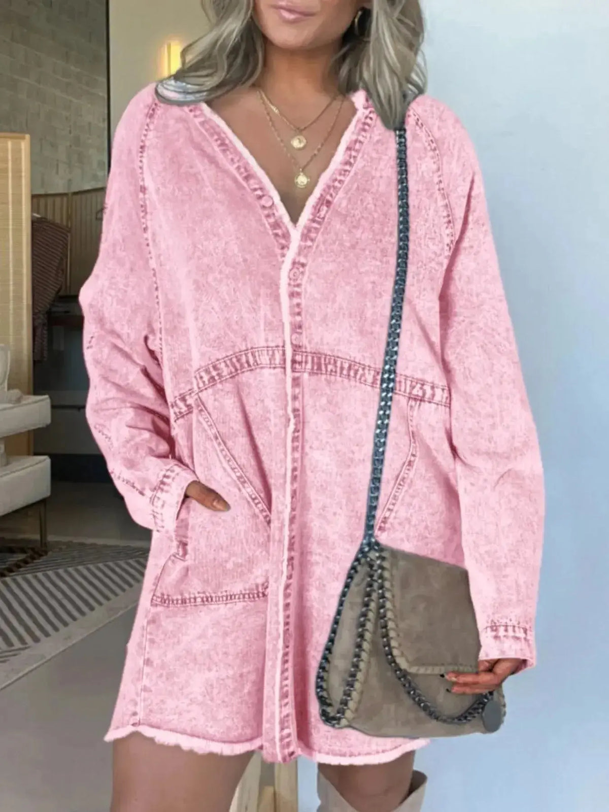 Women’s oversized long sleeve denim shirt dress with front pockets, casual style from Plush Fashion Hub.