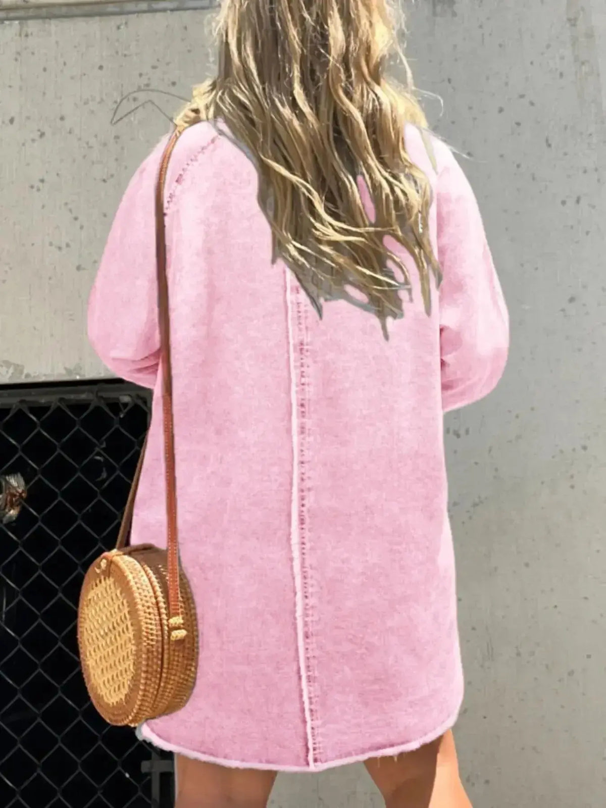 Women wearing an oversized long sleeve denim shirt dress with pockets, stylishly casual and comfortable from Plush Fashion Hub.