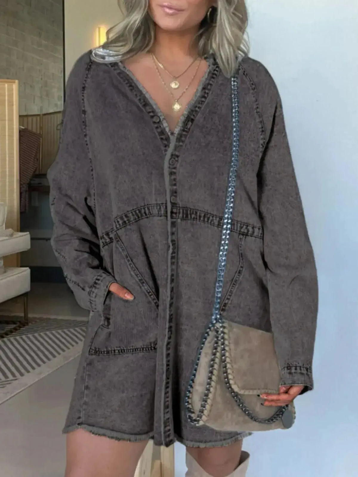 Women’s oversized long sleeve denim shirt dress with front pockets by Plush Fashion Hub, casual and stylish for everyday wear.