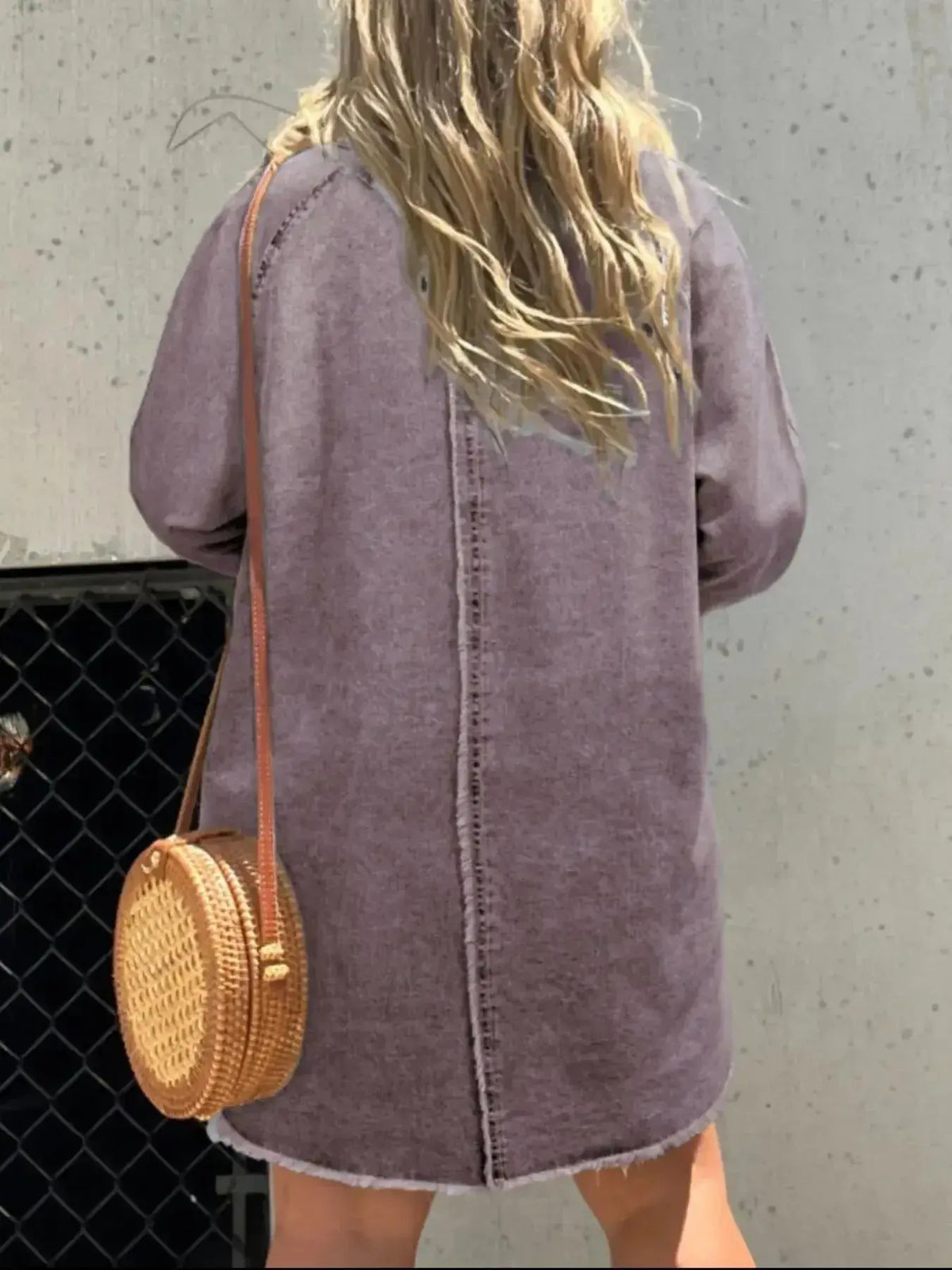 Women wearing a plush fashion hub oversized long sleeve denim shirt dress with pockets, casual style, light blue denim fabric.