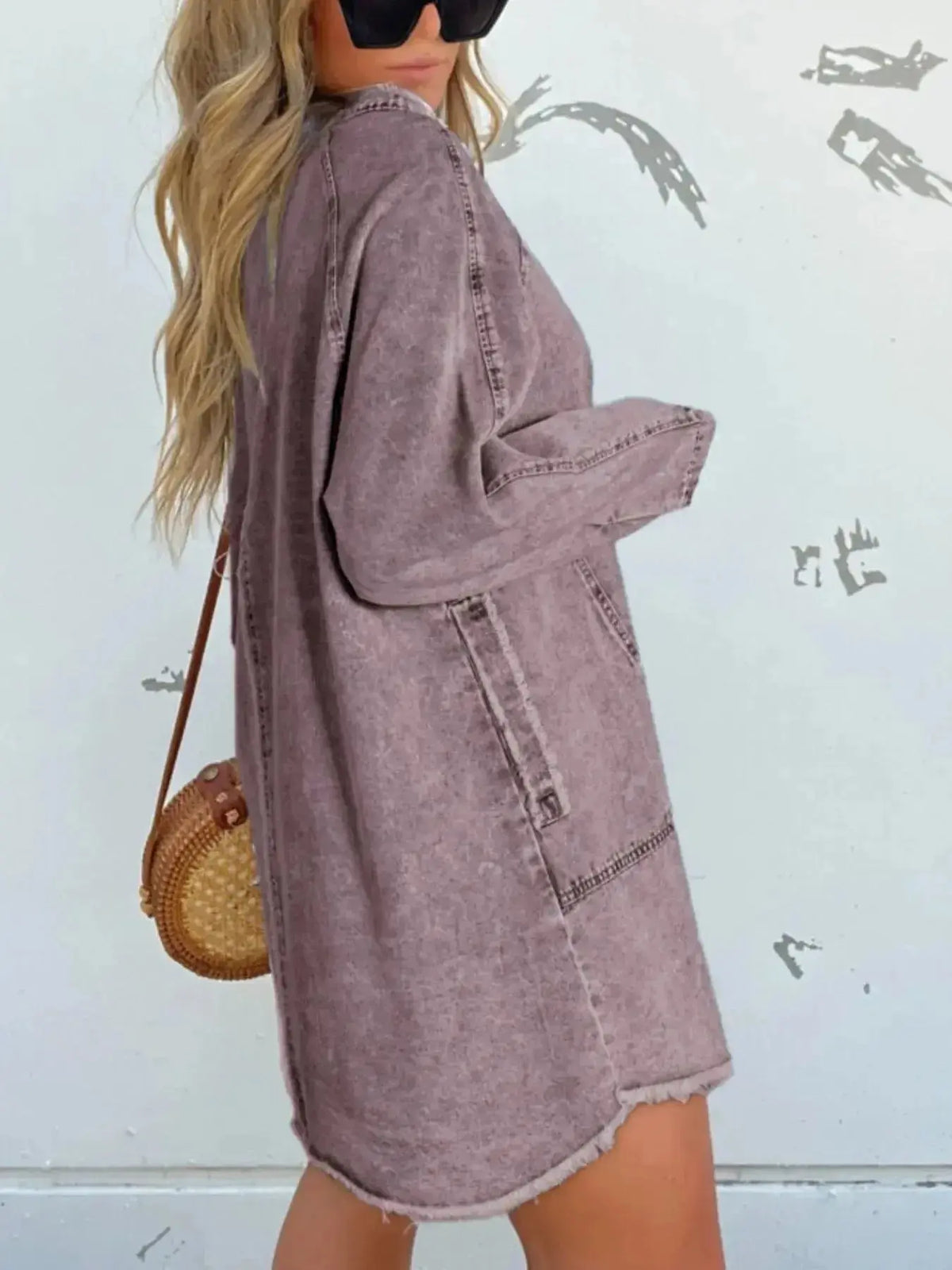 Women’s oversized denim shirt dress with long sleeves and front pockets, by Plush Fashion Hub, styled for casual wear.