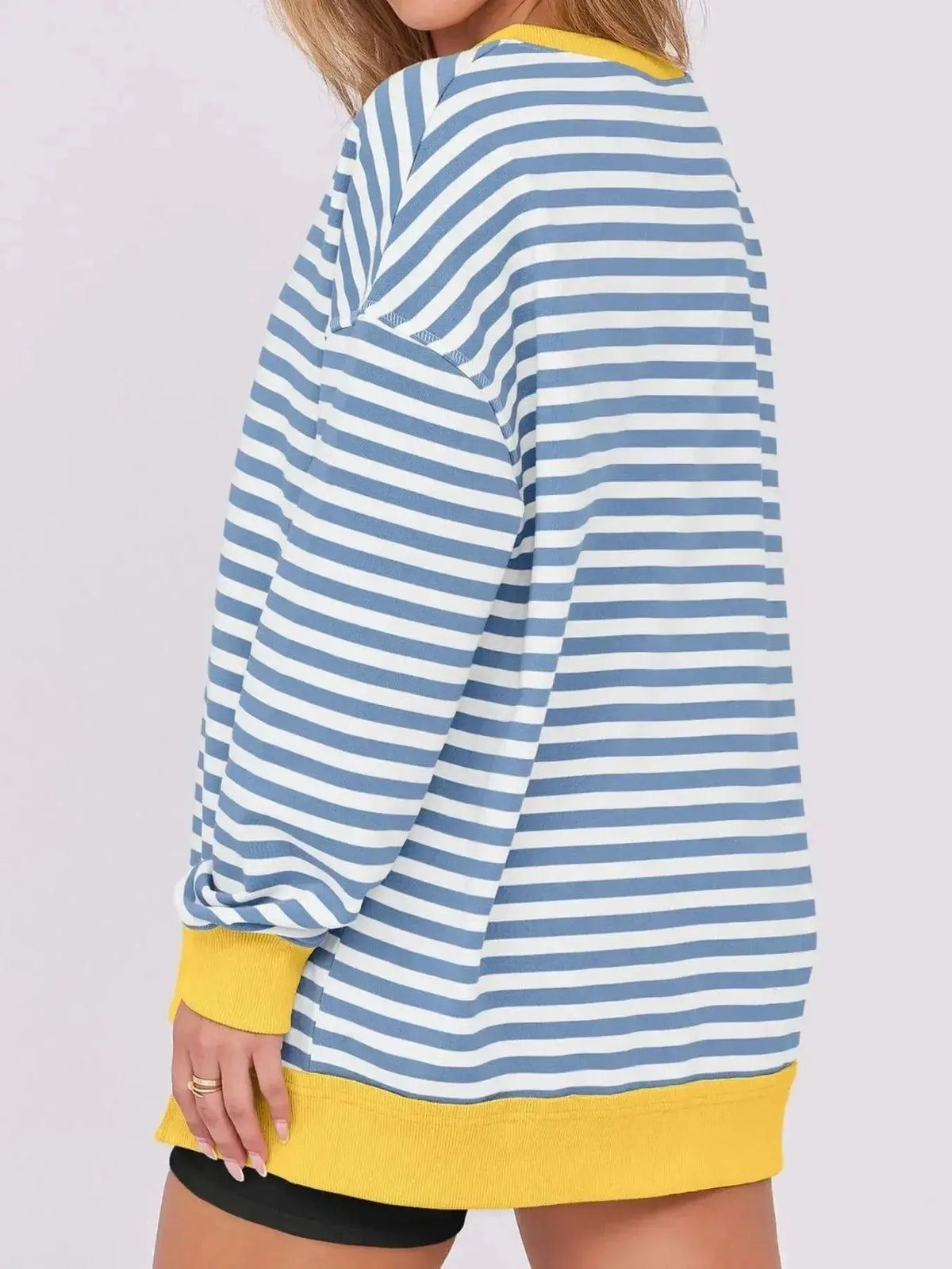 Women’s oversized notched neck sweatshirt with contrast stitching, stylish sweater by Plush Fashion Hub.