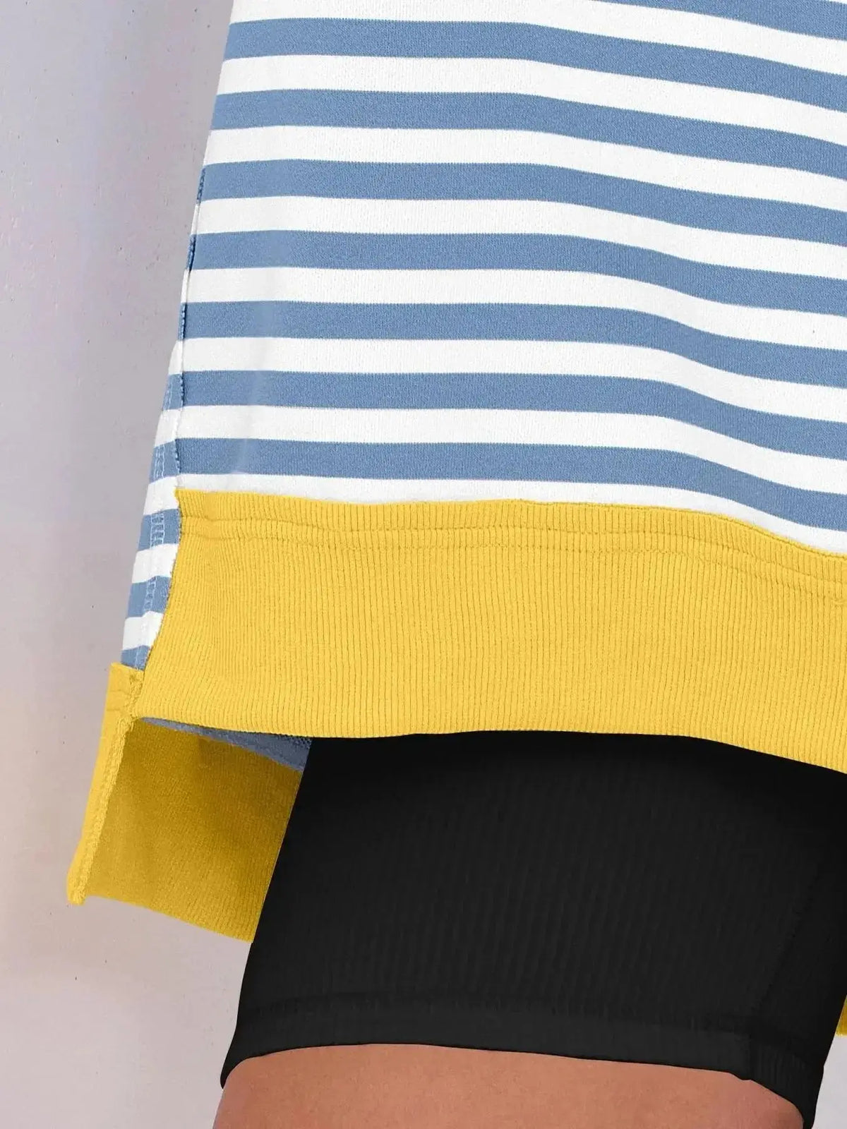Women’s oversized sweatshirt with notched neckline and contrast stitching from Plush Fashion Hub, casual sweater with relaxed fit.