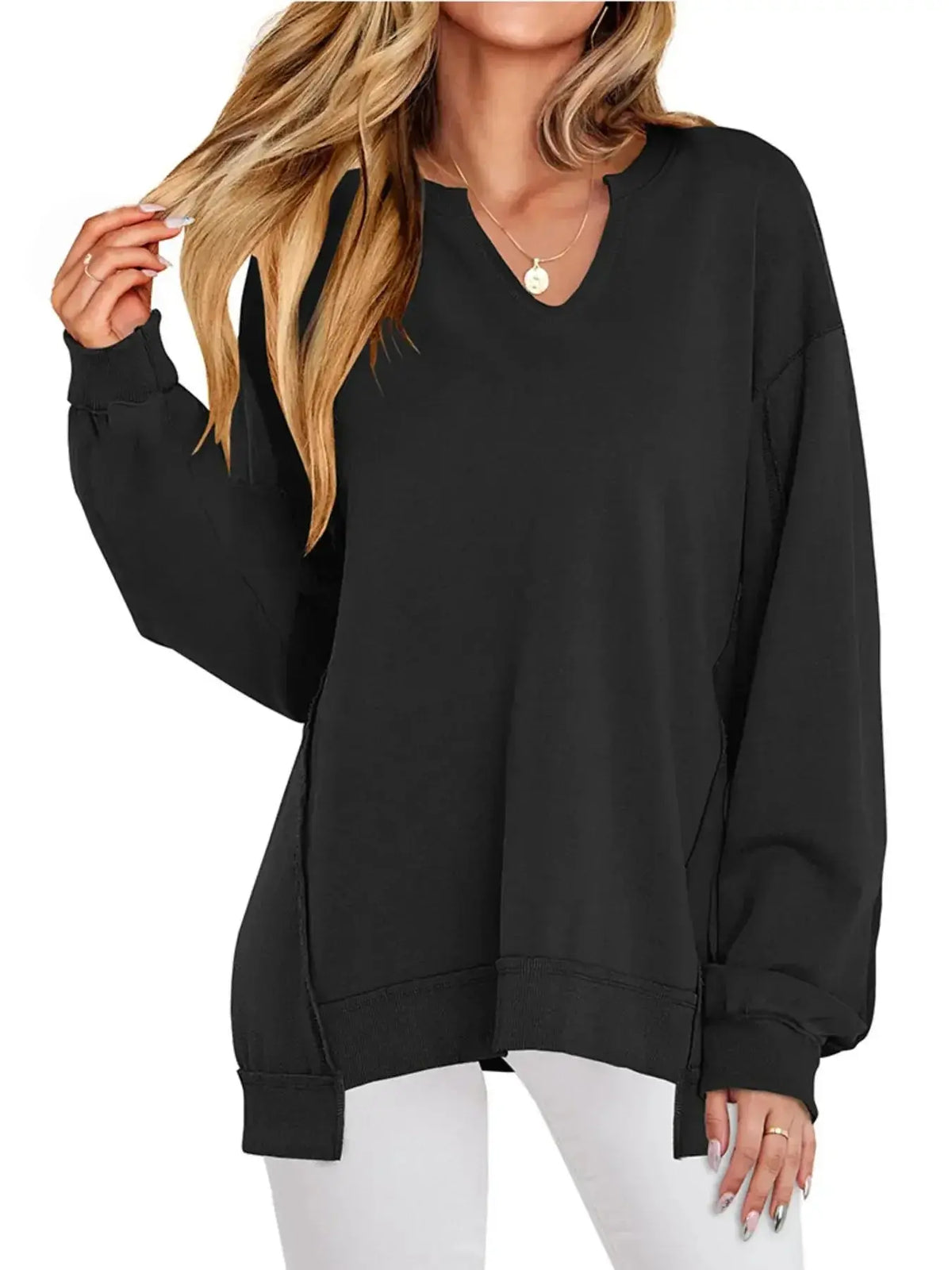 Women’s oversized notched neck sweatshirt with contrast stitching, from Plush Fashion Hub, showing relaxed fit and stylish design.
