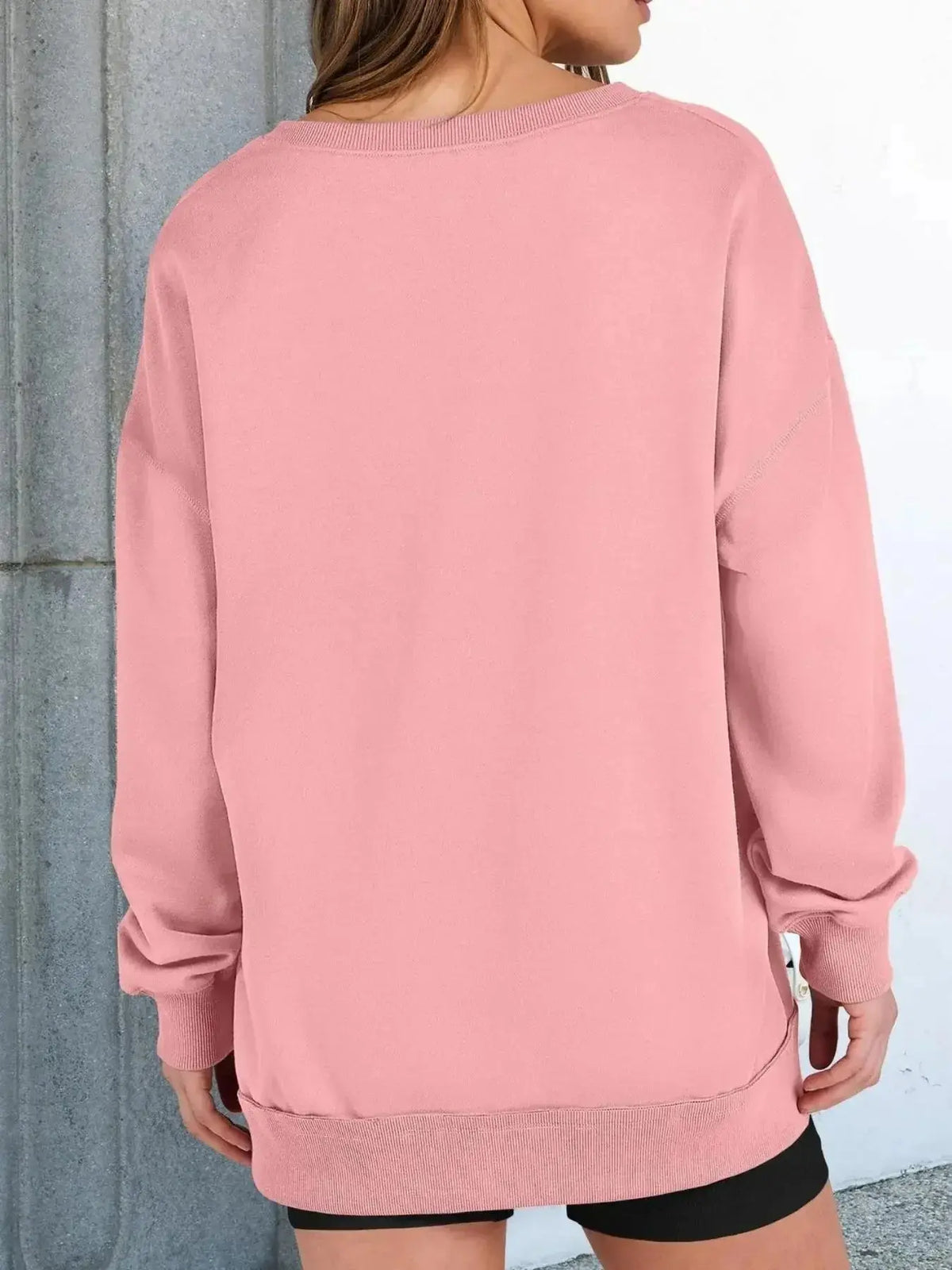 Women’s oversized notched neck sweatshirt with contrast stitching by Plush Fashion Hub, featuring a relaxed fit and stylish design.