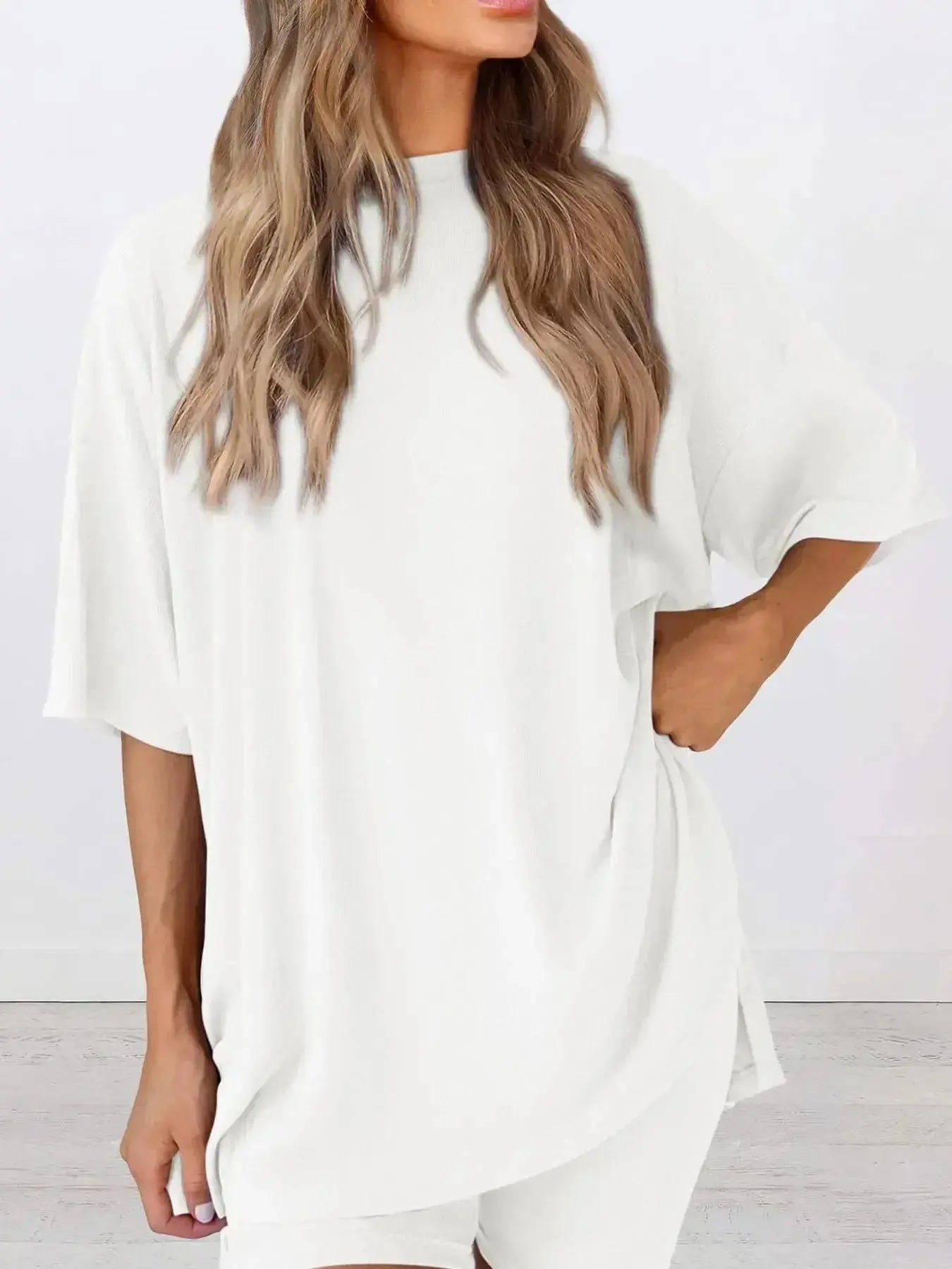 Women’s oversized round neck loungewear set from Trendsi, featuring a comfortable two-piece lounge shirt and matching bottoms.