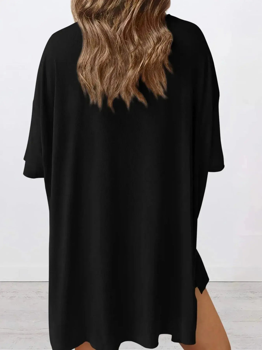 Women's oversized round neck loungewear set by Trendsi, featuring a comfortable two-piece shirt and lounge pants.