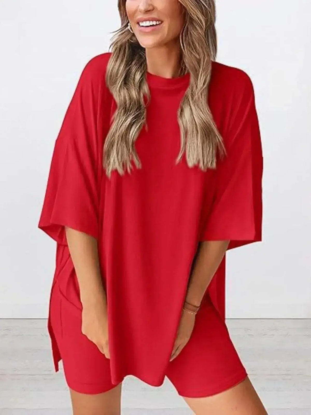 Women’s oversized round neck loungewear set by Plush Fashion Hub, featuring a comfy two-piece shirt and pants for relaxed wear.