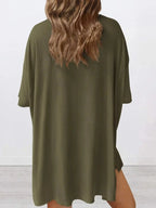 Women's oversized round neck loungewear shirt from Trendsi, part of a cozy two-piece lounge set, in soft, comfortable fabric.