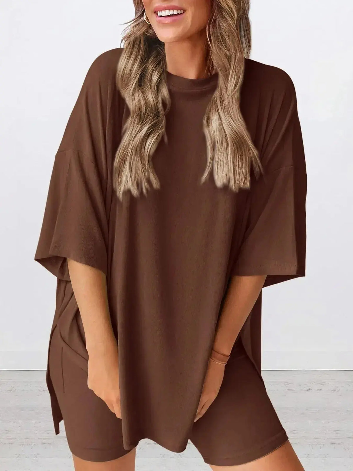 Women’s oversized round neck loungewear set by Plush Fashion Hub, featuring a comfy two-piece shirt and matching pants.