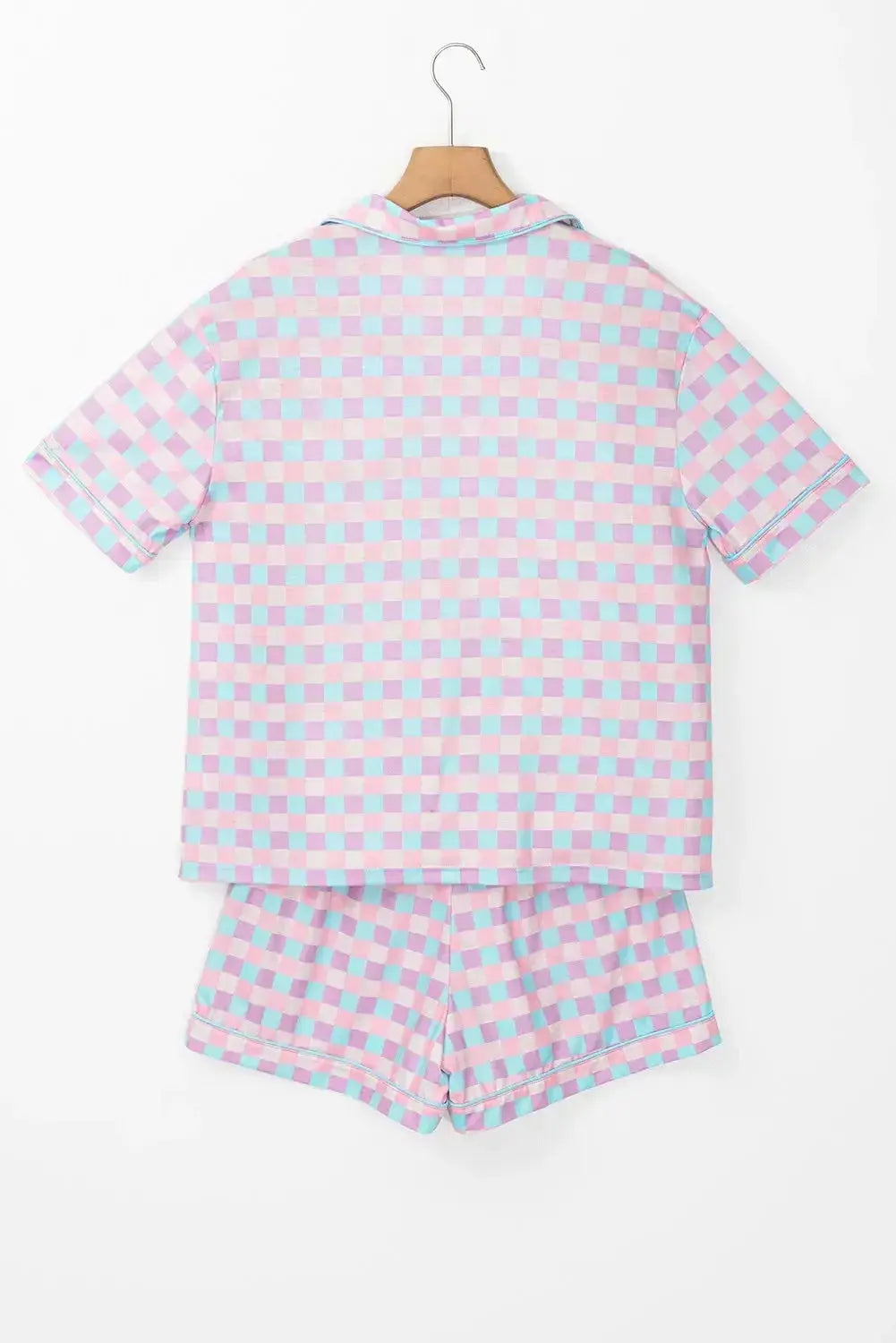 Women’s plaid collared short sleeve pajama lounge set with pockets by Plush Fashion Hub, featuring a comfortable, relaxed fit.