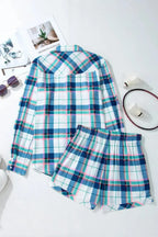 Women's plaid long sleeve pajama lounge set with snap-down top and shorts by Trendsi, featuring a cozy, stylish design.