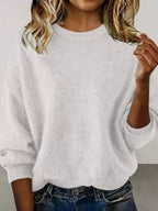Plus size women's relaxed fit sweater with dropped shoulders and round neck, stylish Trendsi knitwear for casual wear