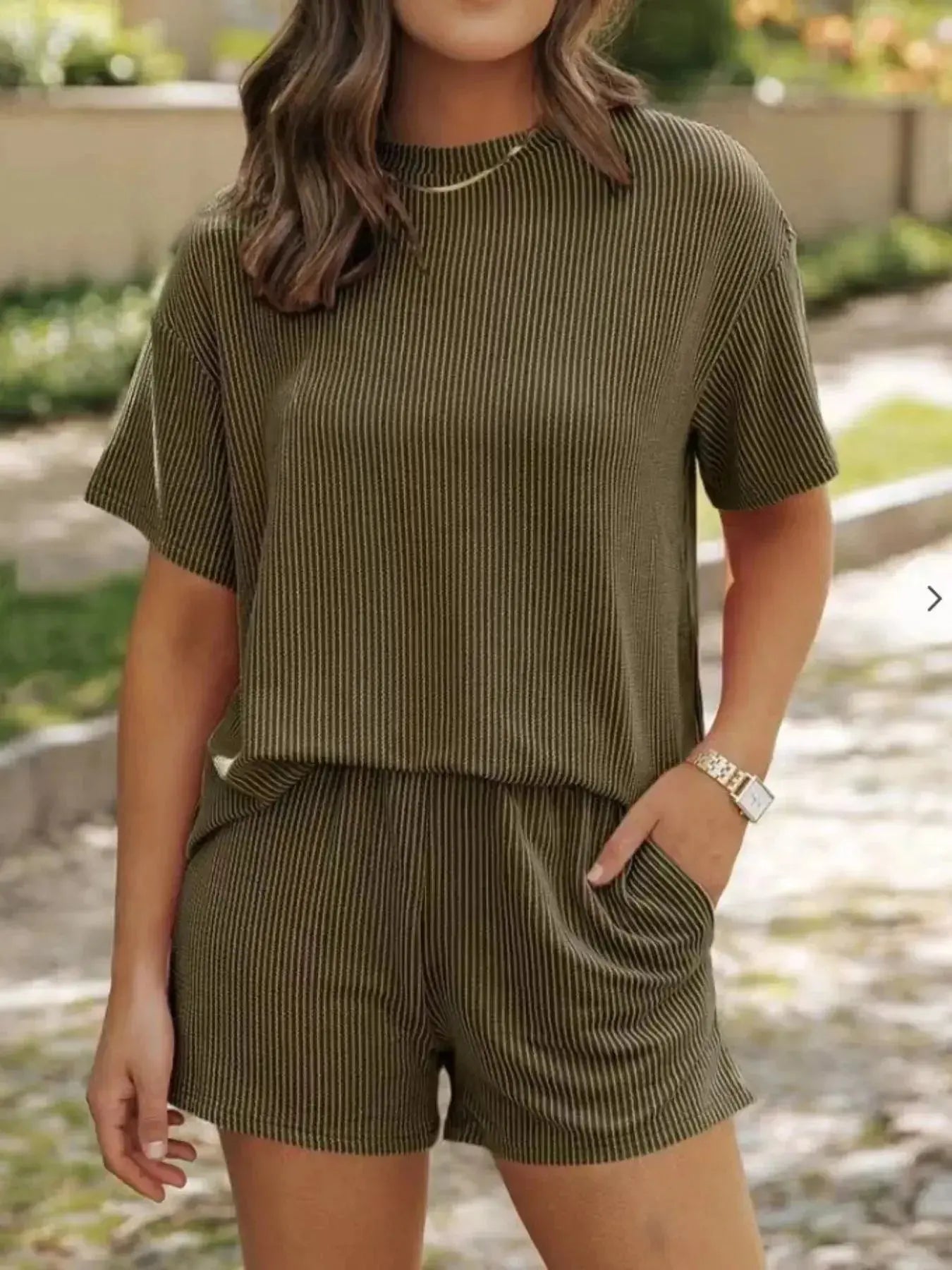 Plus size ribbed women's pajama top and shorts lounge set by Trendsi, comfortable short sleeve pajama sleepwear.