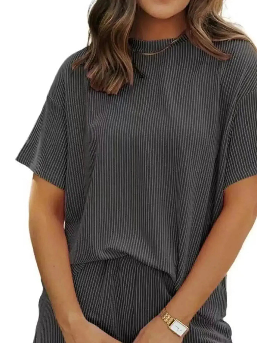 Women's plus size ribbed short sleeve pajama top and shorts lounge set by Trendsi, comfortable sleepwear with a relaxed fit.