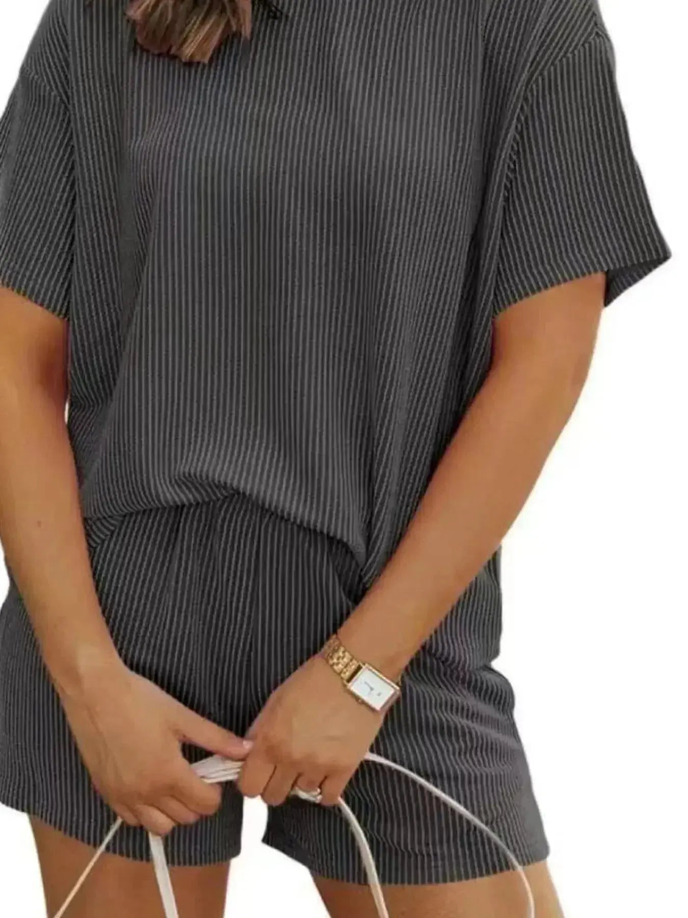 Plus size women's ribbed pajama top and shorts lounge set, short sleeve, comfortable sleepwear from Trendsi.
