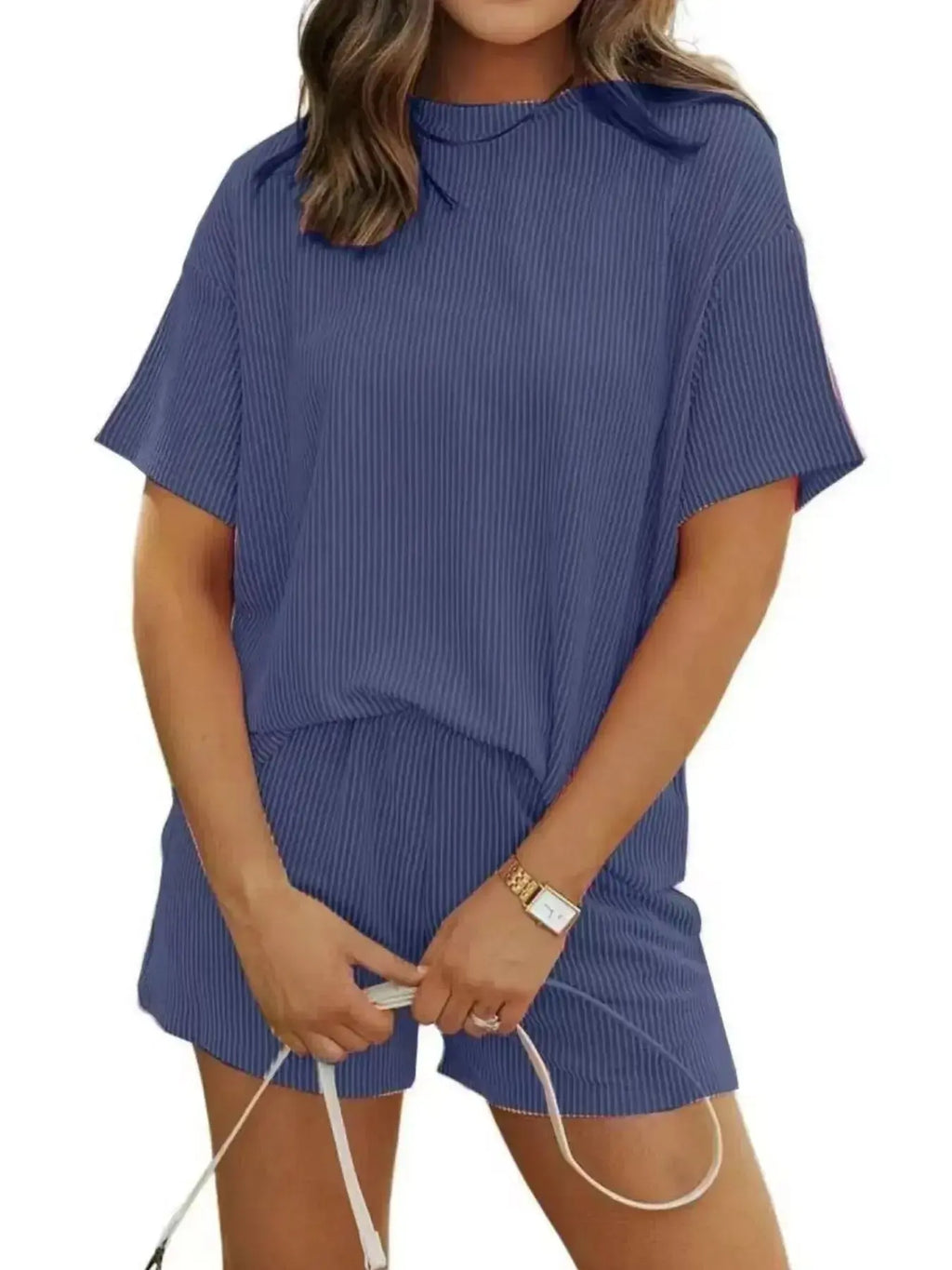 Plus size women's ribbed pajama top and shorts lounge set by Trendsi, featuring short sleeves and comfortable fabric.