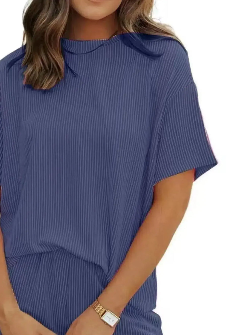 Plus size women's ribbed short sleeve pajama top and shorts lounge set by Trendsi, comfortable sleepwear for women.