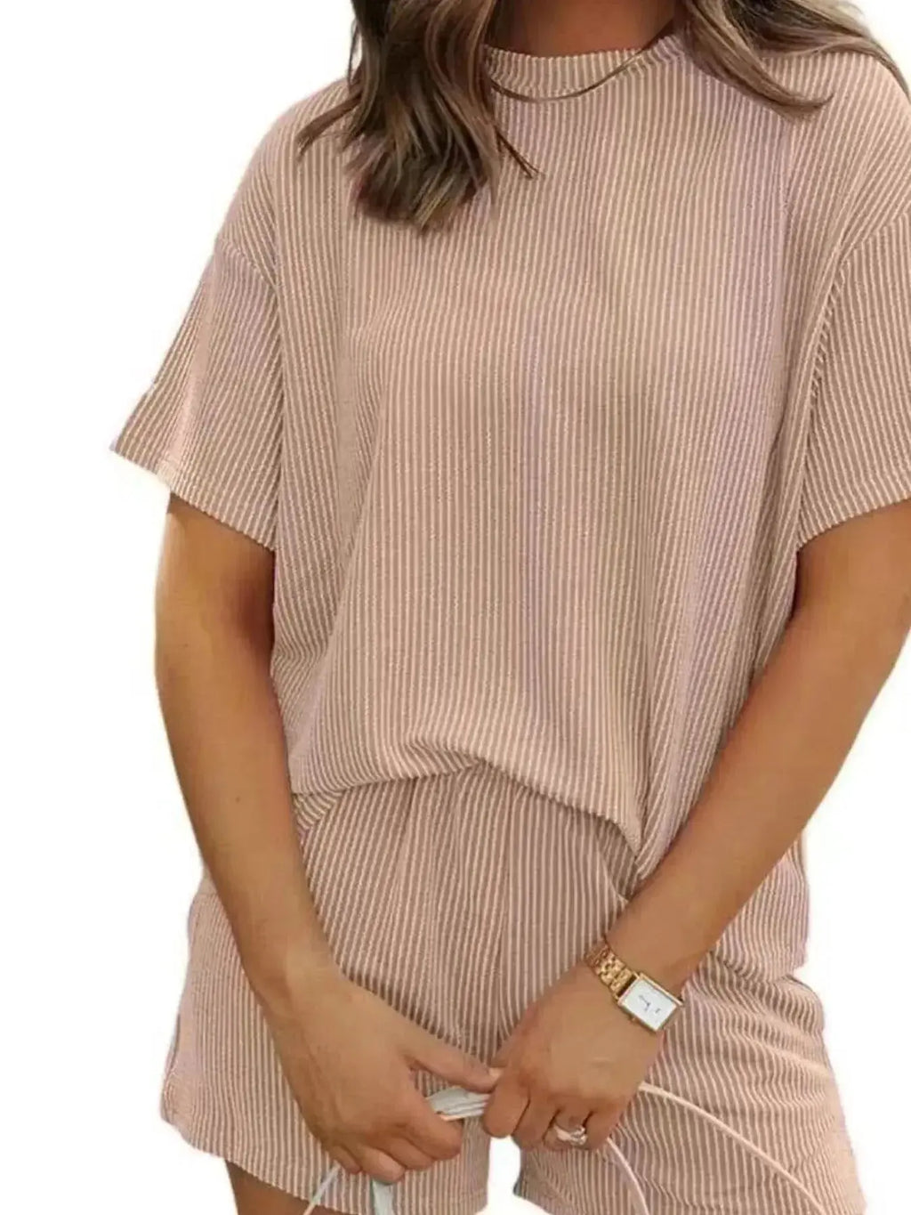 Plus size women's ribbed pajama top and shorts lounge set by Trendsi, featuring short sleeves and comfortable, casual sleepwear.