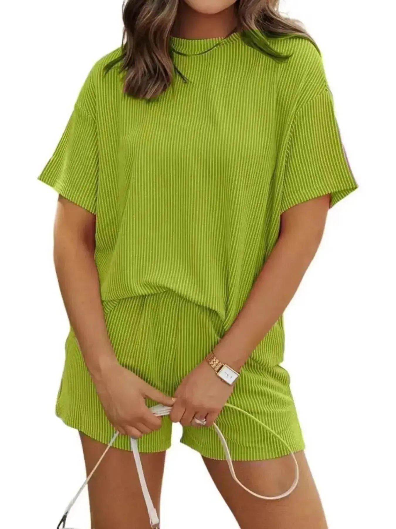 Plus size ribbed short sleeve pajama top and shorts lounge set by Trendsi, comfortable women's sleepwear with a relaxed fit.