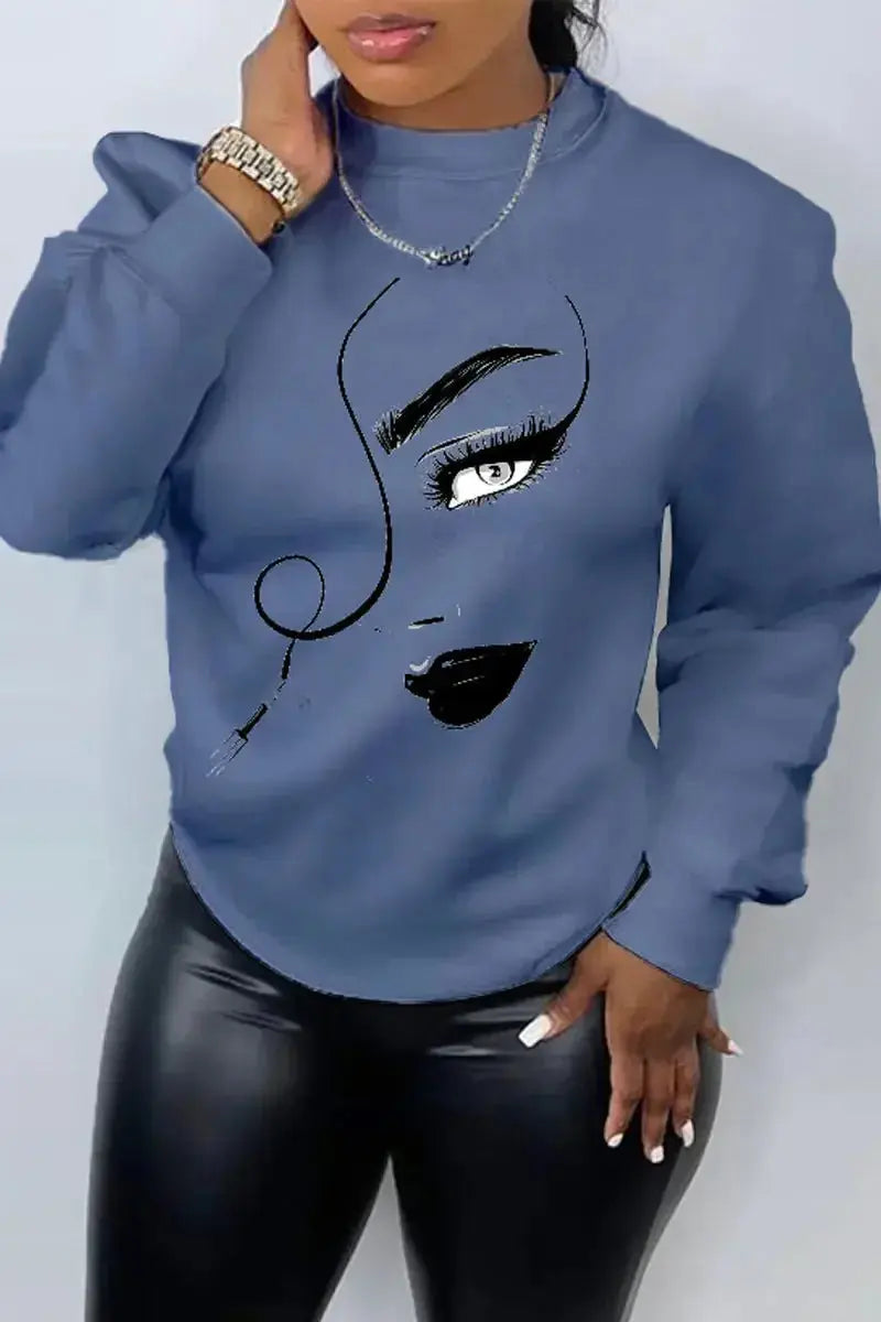 Women’s printed long sleeve crew neck sweater by Plush Fashion Hub, casual knit pullover with relaxed fit and cozy style.