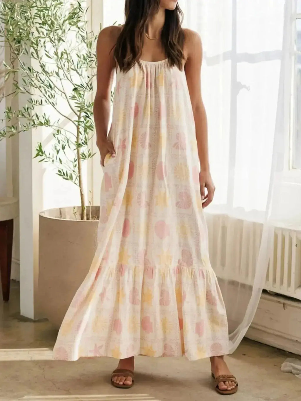 Women's printed maxi lounge dress with ruffled hem and pockets, comfortable pajamas by Trendsi.