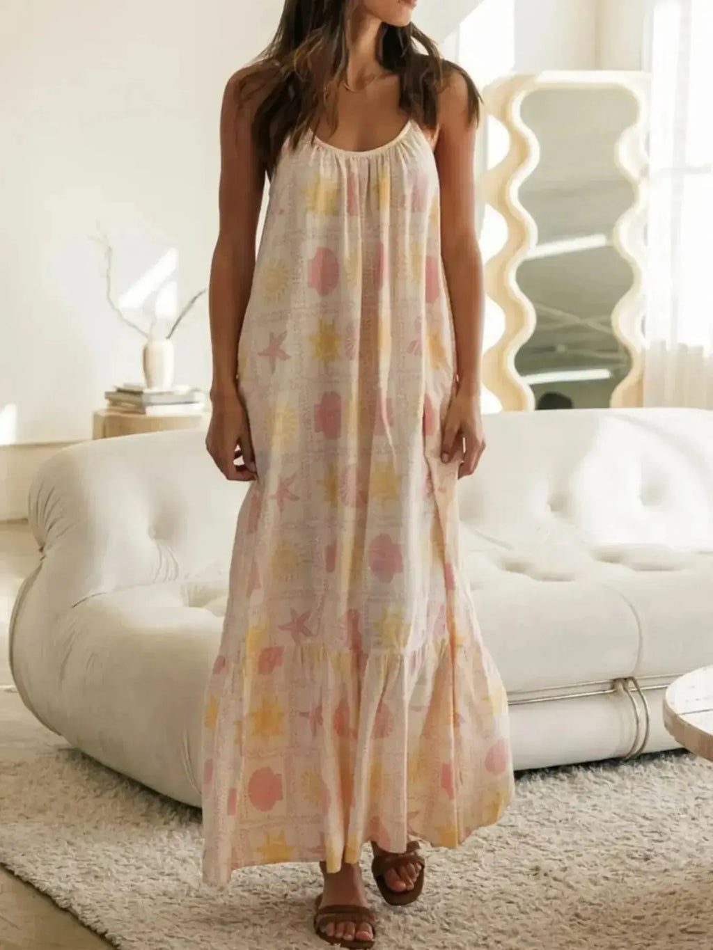 Women's printed maxi lounge dress with ruffled hem and pockets, comfortable pajama style from Trendsi.