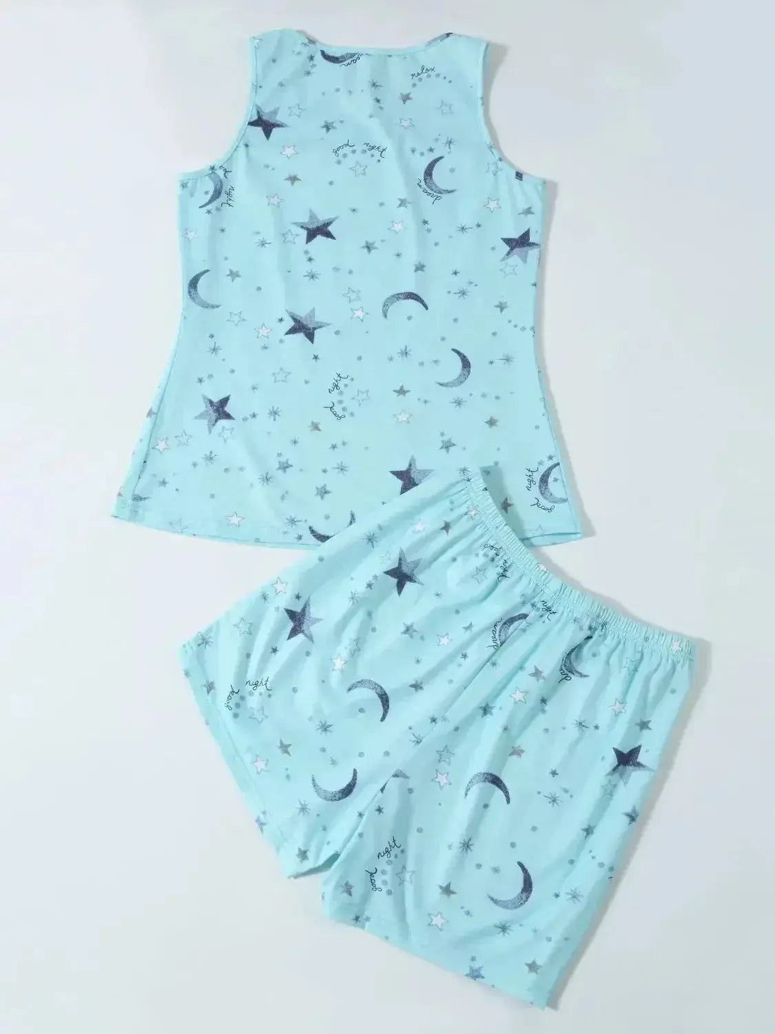 Women wearing plush printed round neck pajama top and shorts lounge set, comfortable sleepwear by Plush Fashion Hub.
