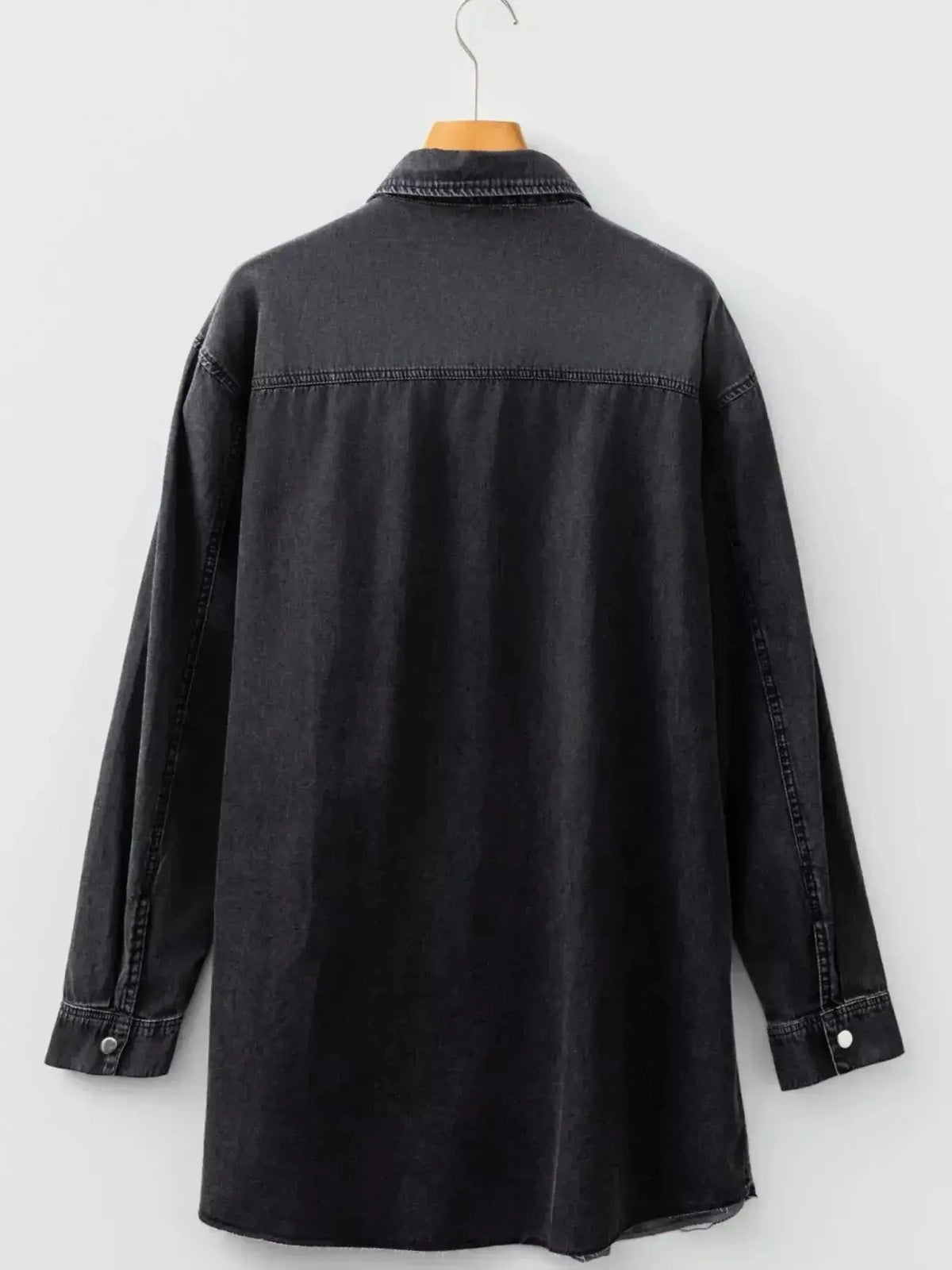 Women wearing Plush Fashion Hub denim long sleeve button-down shirt dress with raw hem, cotton fabric, casual and stylish look.
