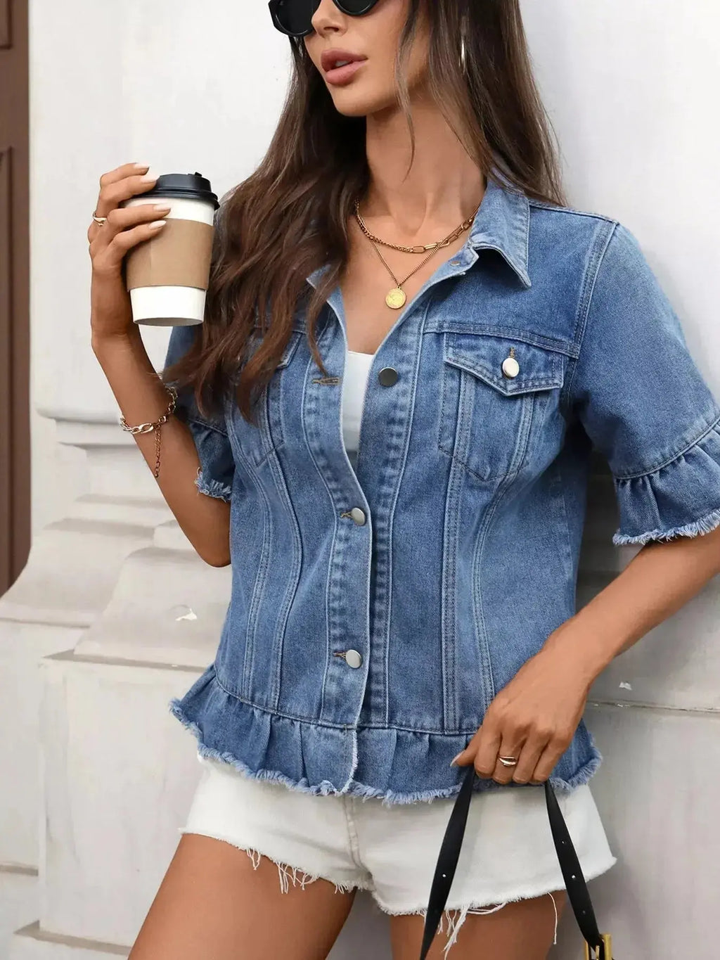 Women’s raw hem ruffled denim jacket by Trendsi, stylish button-up jean jacket with distressed details and ruffled accents.