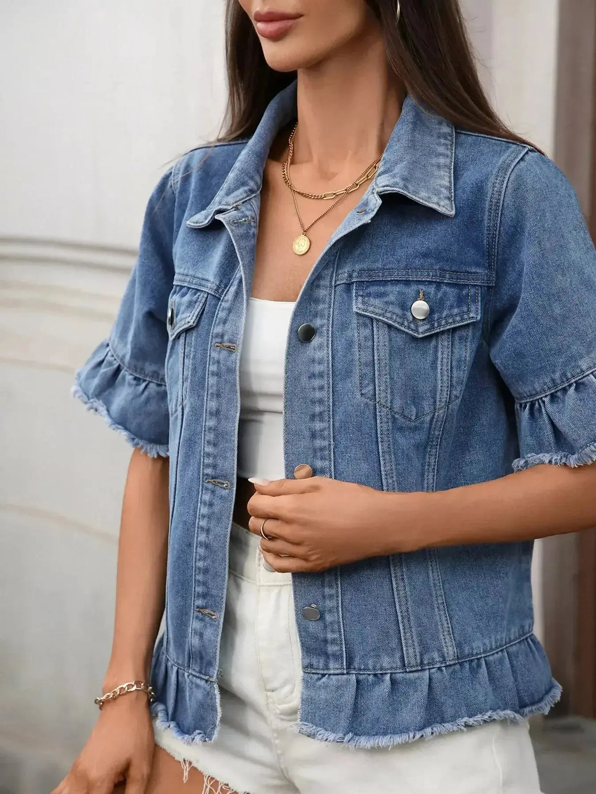 Women’s ruffled raw hem denim jacket by Plush Fashion Hub featuring button-up front and stylish casual design.