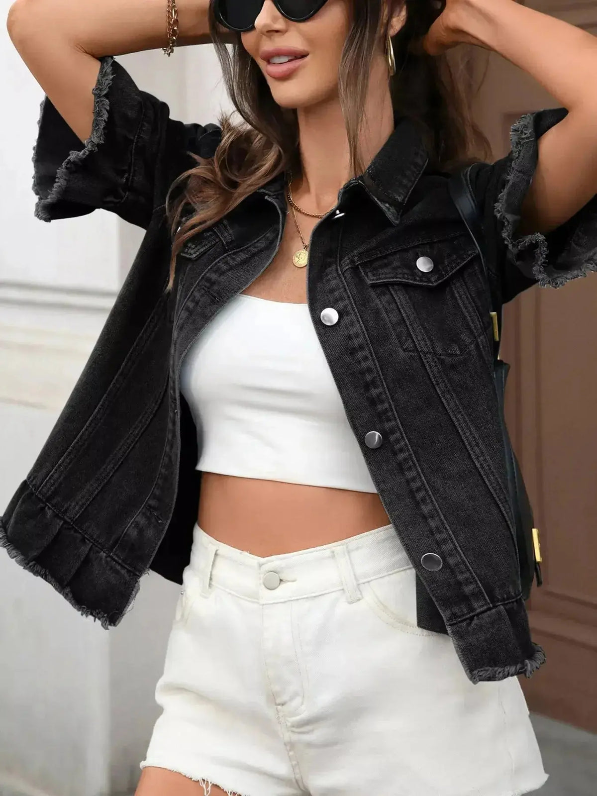 Women’s ruffled raw hem denim jacket by Plush Fashion Hub, stylish button-up jean jacket with trendy ruffle details.