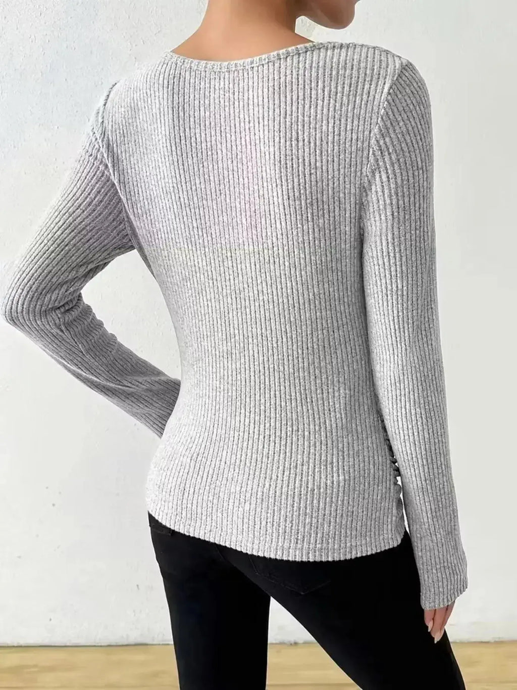Women’s ribbed cowl neck long sleeve sweater with ruched detail by Trendsi, featuring a cozy fit and stylish design.