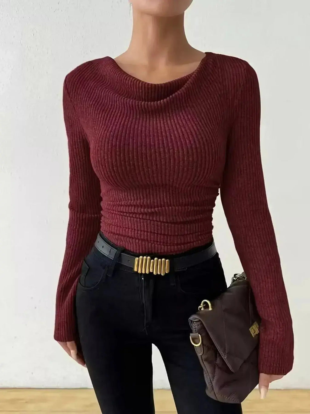 Women's ribbed cowl neck long sleeve sweater with ruched detail from Trendsi, showcasing a cozy, stylish knit design.