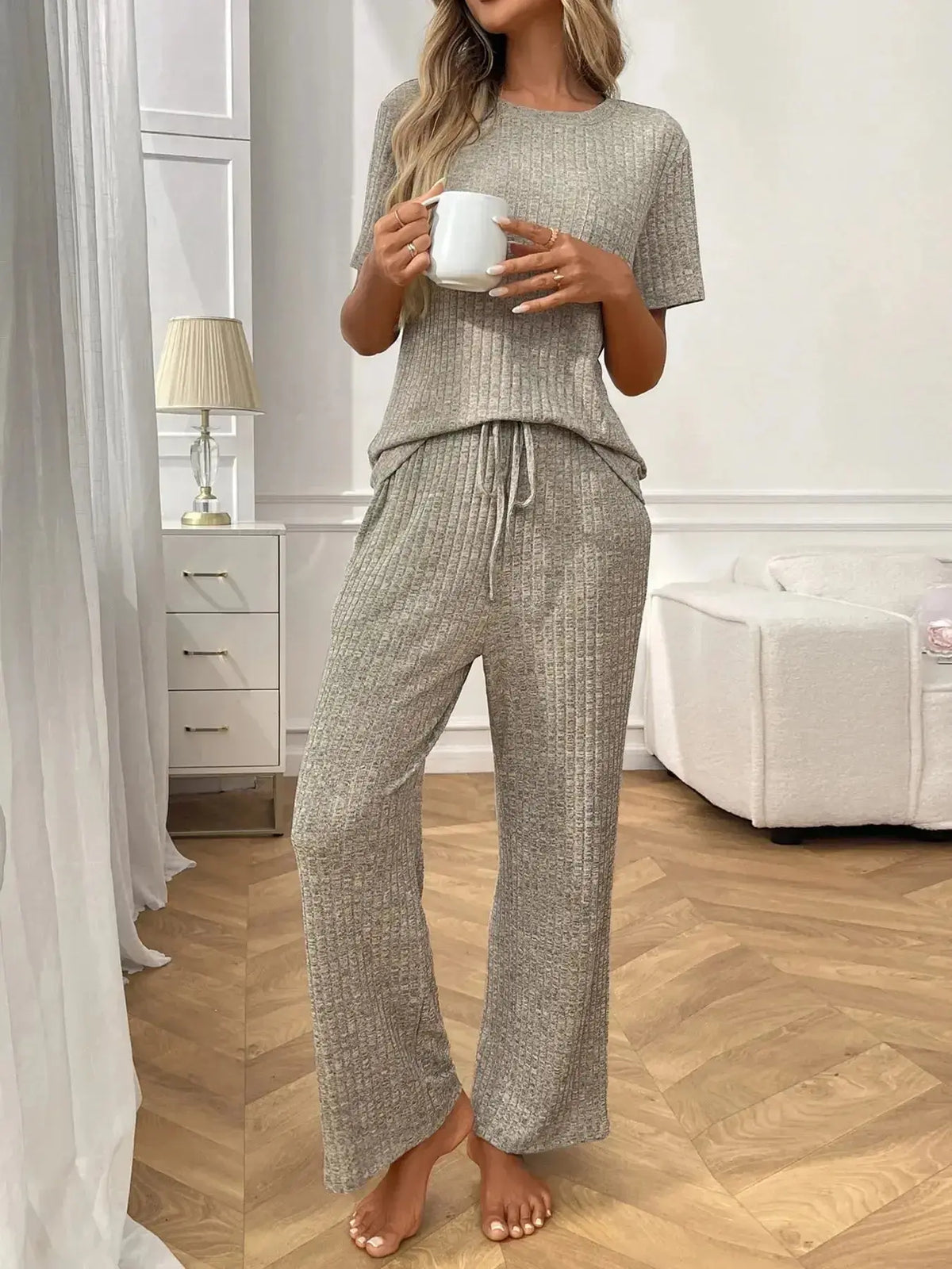 Women’s ribbed knit short sleeve loungewear set with pockets, made by Plush Fashion Hub, perfect for comfortable pajamas.
