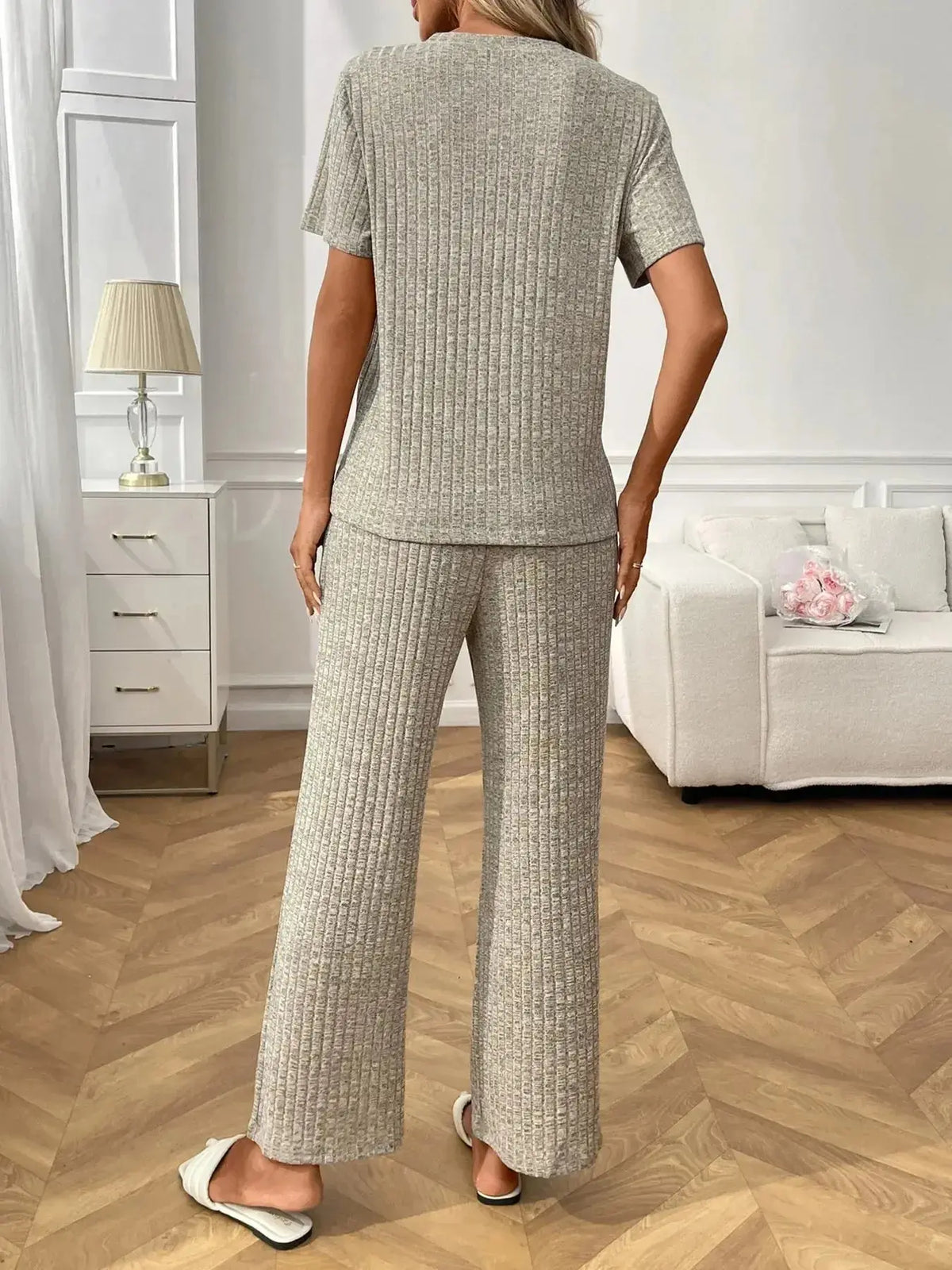 Women’s ribbed knit short sleeve loungewear set with pockets by Plush Fashion Hub, casual pajamas perfect for relaxing at home.