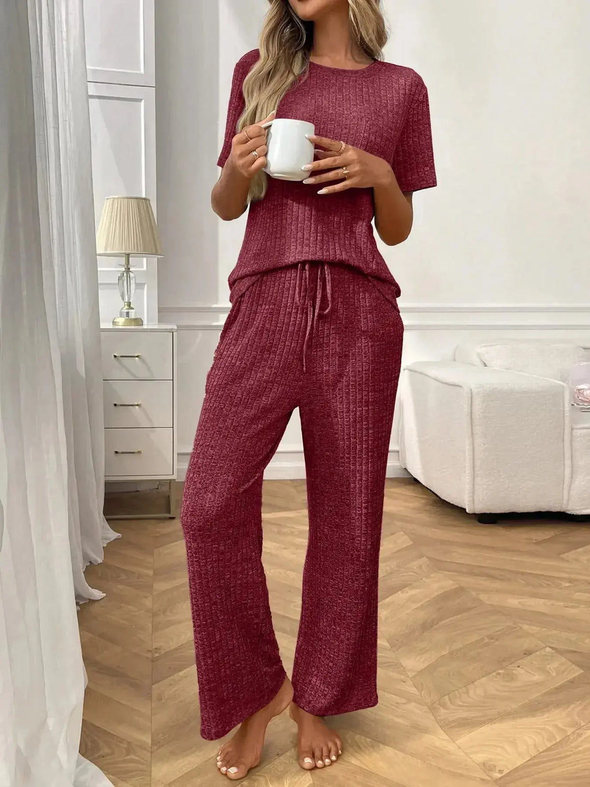 Women's ribbed knit short sleeve loungewear set with pockets by Plush Fashion Hub, featuring a comfortable pajama design.