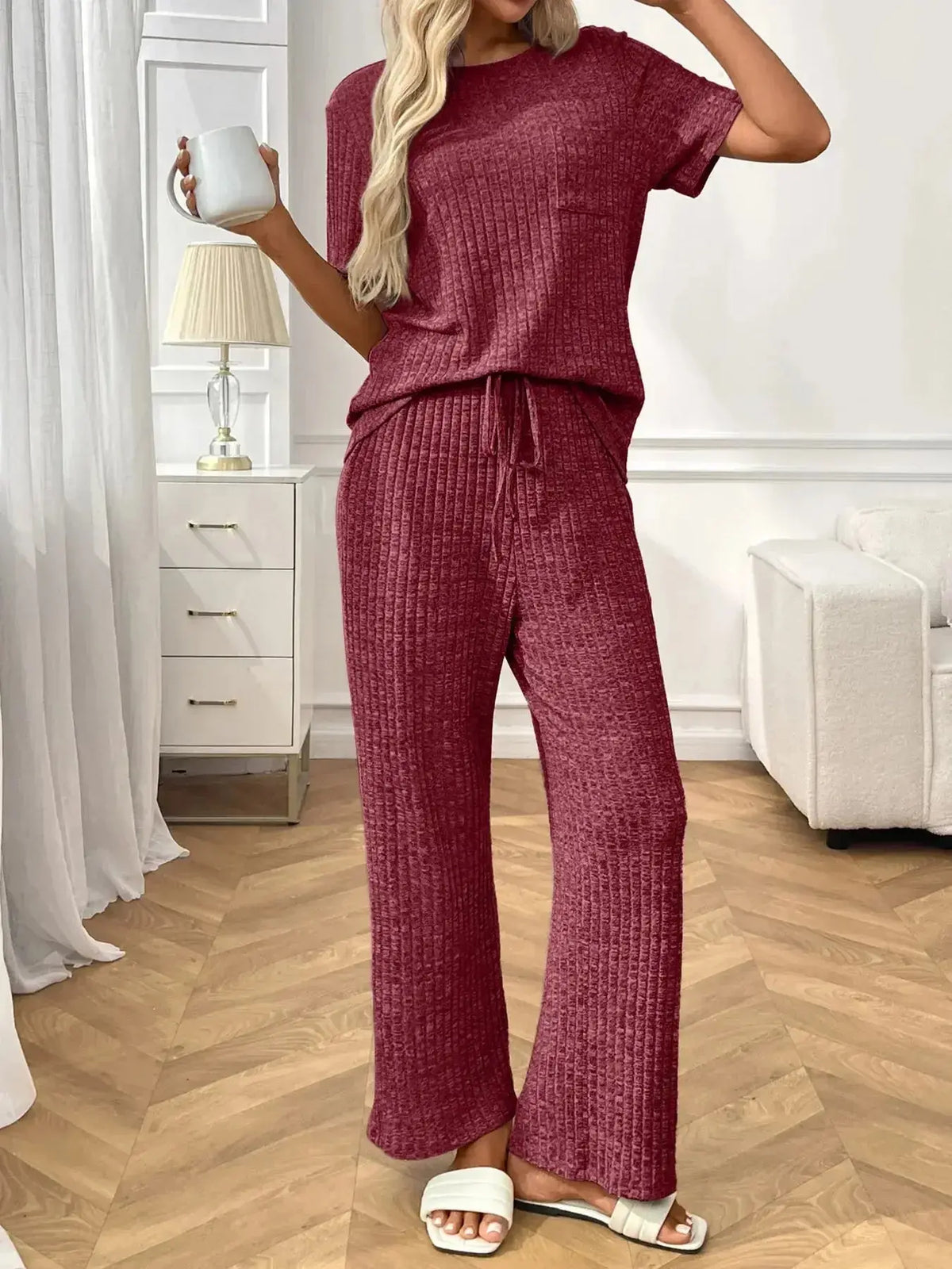 Women's ribbed knit short sleeve loungewear set with pockets by Plush Fashion Hub, cozy pajamas perfect for relaxing at home.