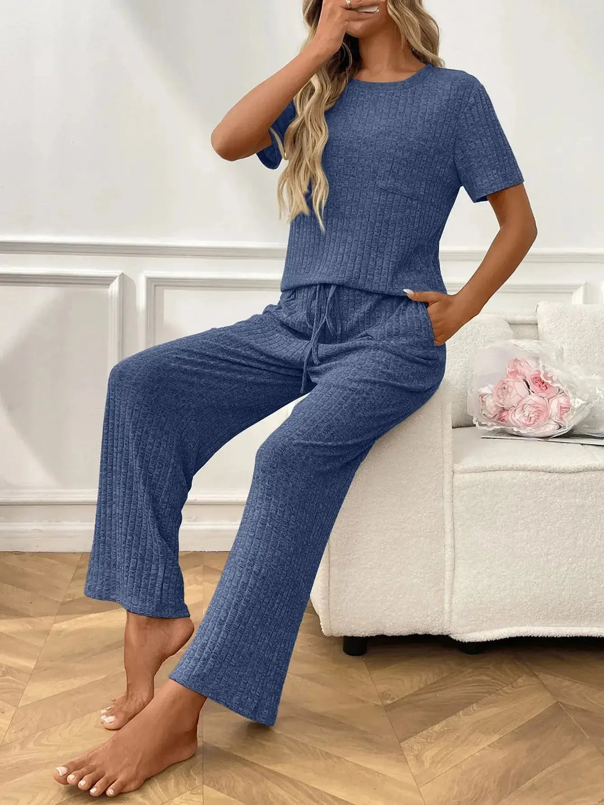 Women’s ribbed knit short sleeve loungewear set with pockets, stylish pajamas by Plush Fashion Hub, perfect for relaxed comfort.
