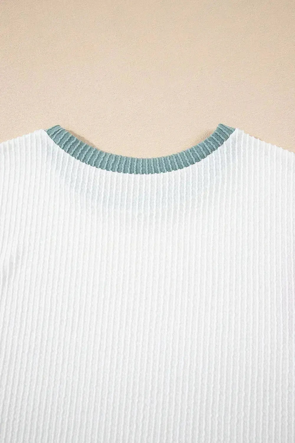 Women's ribbed knit sleeveless tank top with contrast trim, soft fitted shirt by Plush Fashion Hub.