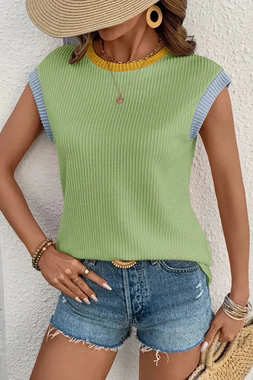 Women’s ribbed knit sleeveless tank top with contrast trim, soft fitted shirt by Plush Fashion Hub.