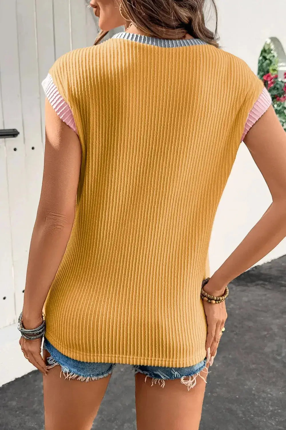 Women's ribbed knit sleeveless tank top with contrast trim, soft fitted shirt from Plush Fashion Hub.