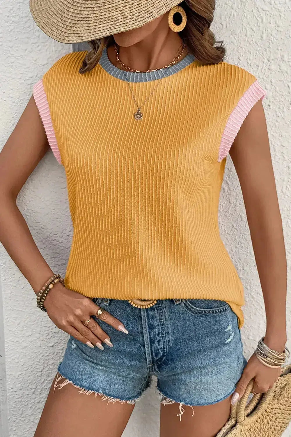 Women’s ribbed knit sleeveless tank top with contrast trim, soft fitted shirt by Plush Fashion Hub.