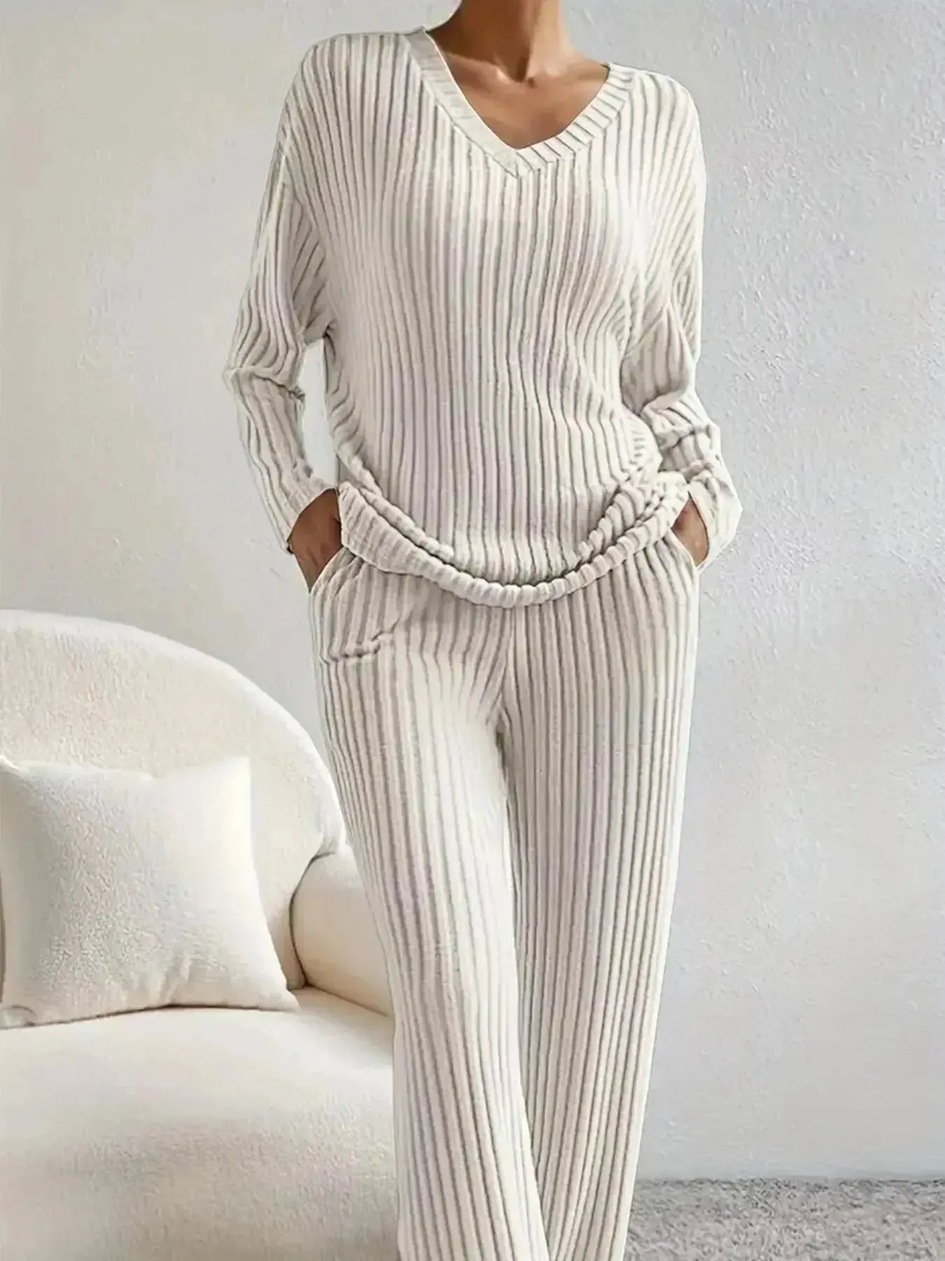 Women's ribbed knit V-neck lounge set by Plush Fashion Hub, featuring a comfortable two-piece matching outfit with a relaxed fit.