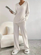 Women's ribbed knit V-neck lounge set by Plush Fashion Hub, two-piece matching outfit with comfortable, cozy fabric.