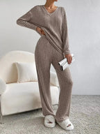 Women's ribbed knit V-neck lounge set by Plush Fashion Hub, comfortable two-piece matching outfit with relaxed fit.